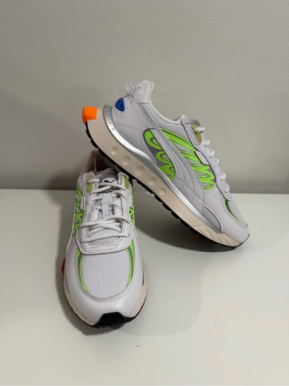 Puma White Sneakers with Neon Green and Orange Accents